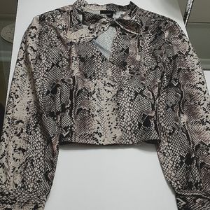 Long sleeve animal print blouse with tie neckline